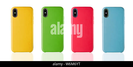Four Yellow and Red, Green, Blue  phone leather cases on white isolated background, classic design accessories. Stock Photo