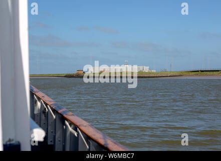 Lady Florence boat trip cruise River Ore, Orford Ness, Suffolk, England BBC World Service radio transmitter building Stock Photo