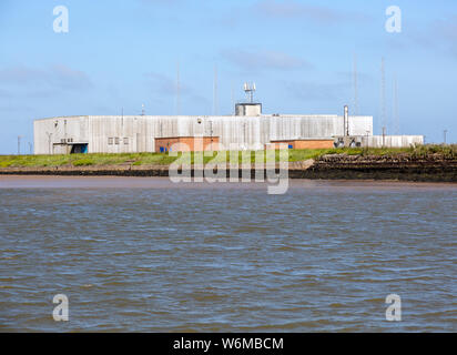 Lady Florence boat trip cruise River Ore, Orford Ness, Suffolk, England BBC World Service radio transmitter building Stock Photo