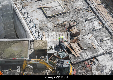 Aerial view of unidentified construction worker in construction site in London Stock Photo