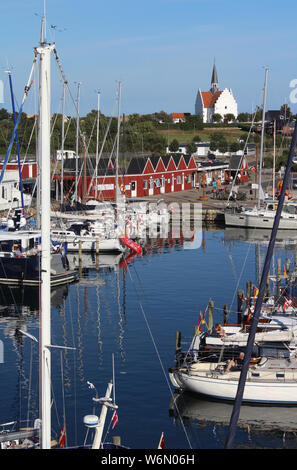BAGENKOP, DENMARK, 17 JULY 2019: View of the picturesque harbour of Bagenkop in Denmark, on a busy summers evening. Bagenkop is a popular resort