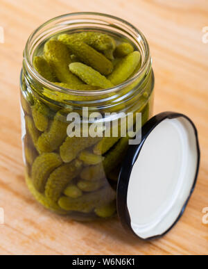 Download Image Of Opened Glass Jar With Pickled Cucumbers Isolated Over White Background Stock Photo Alamy PSD Mockup Templates