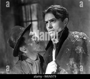 F.J. McCORMICK and JAMES MASON in ODD MAN OUT 1947 director CAROL REED novel F.L. Green screenplay F.L. Green and R.C. Sherriff  Two Cities Films / General Film Distributors (GFD) Stock Photo