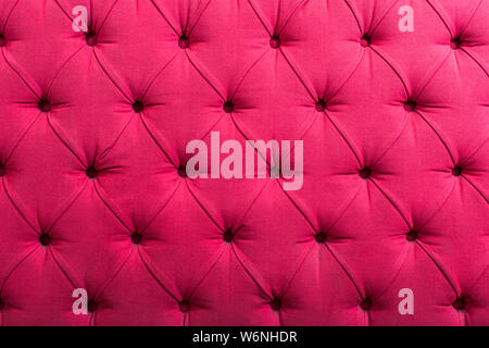 background with bright pink upholstered old-fashioned furniture textile Stock Photo