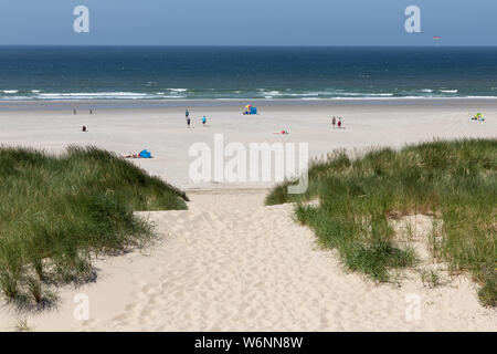 Sand path leading to beach Dutch coast of North Sea Stock Photo