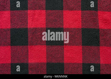 Black and Green Fabric in a Cage. Plaid material. Clothes background Stock Photo