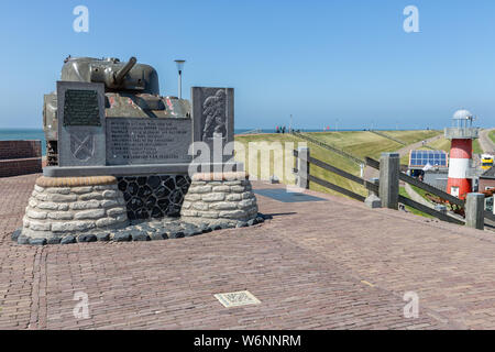 Military tank at dike near Westkapelle, battlefield of WW2 Stock Photo