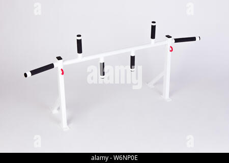 Sports wall horizontal bar isolated on white background. Stock Photo