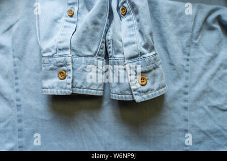 Blue Casual Brown Shirt With Brown Buttons Stock Photo
