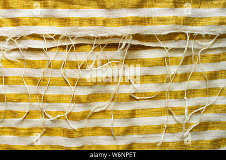 Yellow-White Striped Fabric Background. Gold Metallic Thread Striped Knitted Fabric