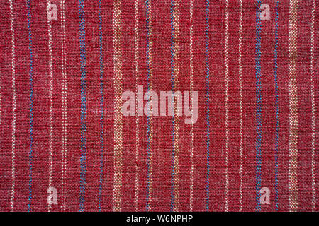 Red coarse fabric with thin stripes of a different color. Texture fabric blank background Stock Photo