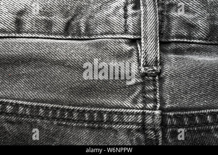Gray jeans pockets. Texture of cotton fabric pants. Gray denim fabric Stock Photo