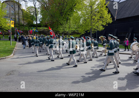 Järfällas' concert music band playing live in the street during the annual Norwegian independence day celebration events held in Skansen Park, Sweden. Stock Photo