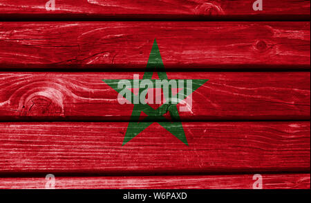 Morocco flag painted on wooden background, closeup. Stock Photo