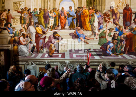 Guided group of visitors in the Vatican Museums in Roma, Italy Stock Photo