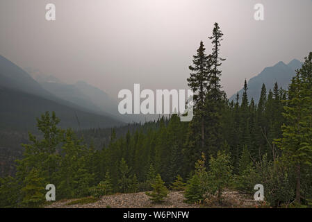 Forest fire smoke in Kootenay National Park, British Columbia, makes a ...
