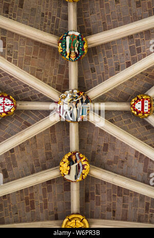 Vaulted ceiling / roof with bosses where each boss acts as keystone, locking the ribs of the vault in place; Above the nave of Exeter Cathedral. Exeter UK (110) Stock Photo