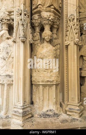 Close up of stone statue figures / statues / figure / sculpture carved in Image screen on the West front facade on the outside of Exeter Cathedral. UK (110) Stock Photo