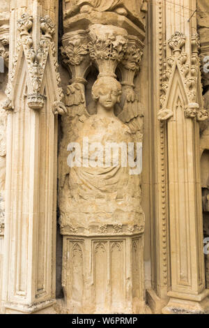 Close up of stone statue figures / statues / figure / sculpture carved in Image screen on the West front facade on the outside of Exeter Cathedral. UK (110) Stock Photo