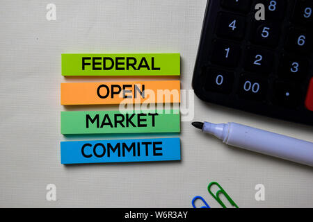 Federal Open Market Commite - FOMC text on sticky notes isolated on office desk Stock Photo