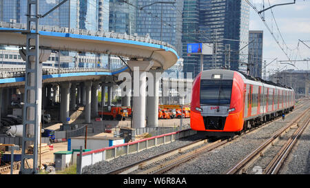 Moscow, Russia - July 30, 2019: new train of the Moscow Central Railway Circle of the MCC, called Swallow. Against the background of the quarter Mosco Stock Photo