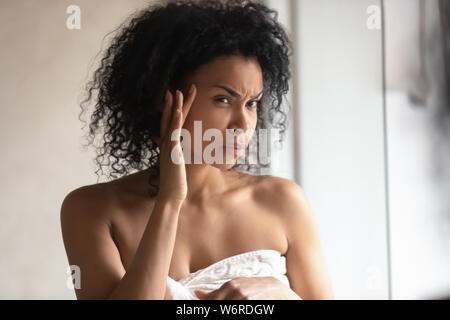 Close up portrait 30s woman found facial wrinkles feels worried Stock Photo