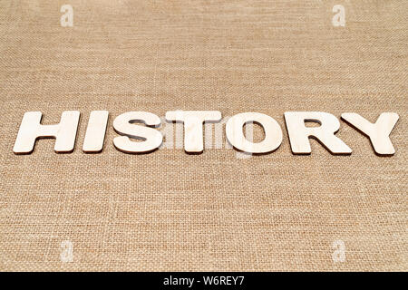 word history laid out from wooden letters on the old canvas Stock Photo