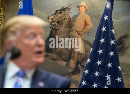 Washington, United States Of America. 02nd Aug, 2019. A portrait of former United States President Theodore Roosevelt is seen as US President Donald J. Trump announces a U.S. beef trade deal with the European Union, in the Roosevelt Room at the White House in Washington, DC on Friday, August 2, 2019. Credit: Kevin Dietsch/Pool via CNP | usage worldwide Credit: dpa/Alamy Live News Stock Photo