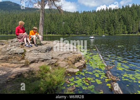 Hiking break, Big Lake Arber, Bayerisch Eisenstein, Bayerischer Wald, Bavaria, Germany Stock Photo