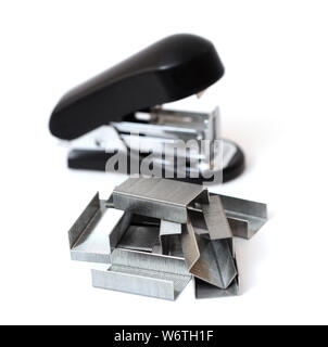 a lot of staple and stapler on white background Stock Photo