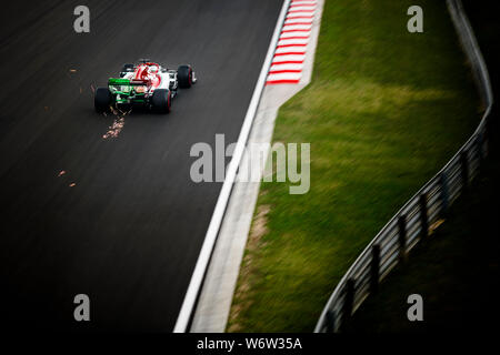 Alfa Romeo Racing's Finnish driver Kimi Raikkonen competes during the first practice session of the Hungarian F1 Grand Prix. Stock Photo