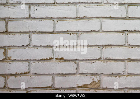 Seamless design vintage style in natural light ancient cream beige yellow brown brick wall textured background. white brick wall, texture of whitened Stock Photo