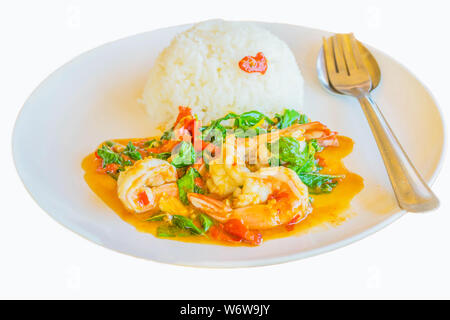 Thai style food, stir fried shrimp basill on rice with the white background. Stock Photo