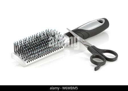 A hair brush and scissors isolated on white Stock Photo