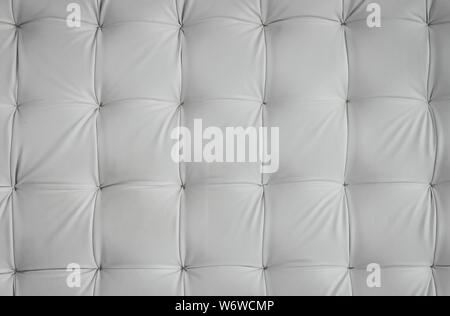 White leather upholstery texture pattern background. Vector vintage royal sofa leather upholstery buttons seamless pattern Stock Photo