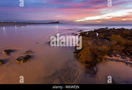 Beautiful morning sunrise at Nobbys Beach Newcastle Australia. Nobbys Beach is one of the most famous beaches in Newcastle NSW Australia. Stock Photo