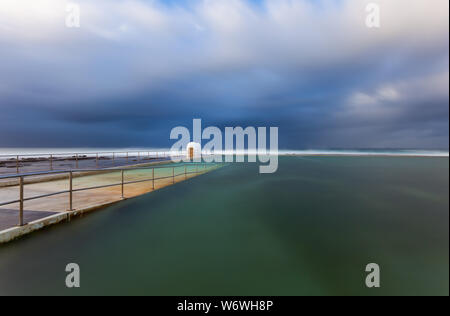 Storm day at Merewether Baths - Newcastle NSW Australia. These ocean baths are a famous landmark in the seaside city of Newcastle. They are some of th Stock Photo