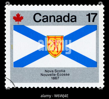 CANADA - CIRCA 1979: A stamp printed in Canada from the 'Canada Day. Flags' issue shows Nova Scotia flag, circa 1979. Stock Photo