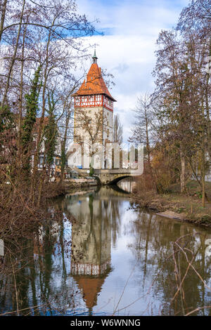 Germany, Historic city gate of waiblingen reflecting in water Stock Photo