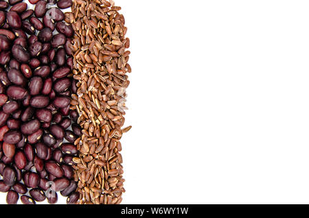 red beans and brown ruby rice on a white background with copy space Stock Photo