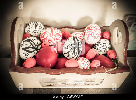 A box full of Easter eggs with hand drawn flowers Stock Photo