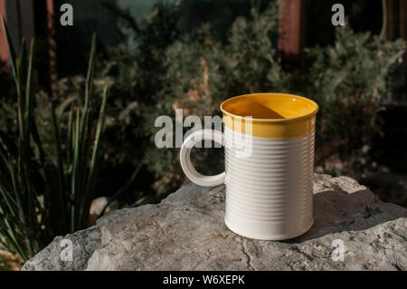 Ceramic tea mug closeup on stone surface closeup Stock Photo
