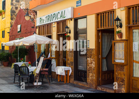 Restaurant on the Spanish Island of Tenerife. The owner is getting ready for the day's service. Stock Photo