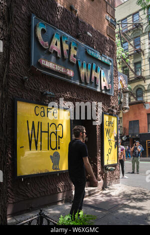 Cafe Wha? New York, view of the Cafe Wha? signs on the corner of MacDougal St. and Minetta Lane in the center of Greenwich Village, New York City, USA. Stock Photo