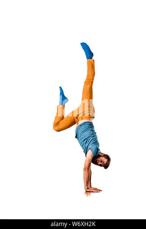 Amazing dancer is doing breakdance on a white background Stock Photo