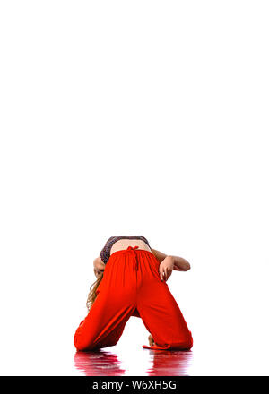 Female zumba instructor doing dancing exercises in sport club Stock Photo