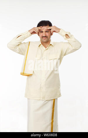 South Indian man suffering from headache Stock Photo