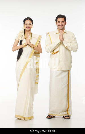 South Indian couple welcoming with hands joined Stock Photo