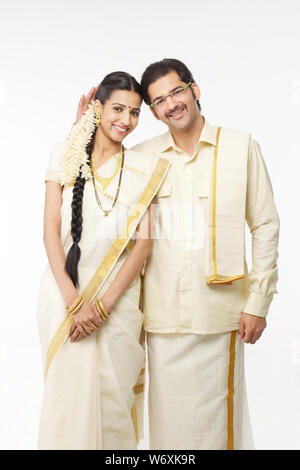 South Indian couple standing together Stock Photo - Alamy