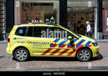 Dutch ambulance Volkswagen Touran in the city of Amsterdam Stock Photo